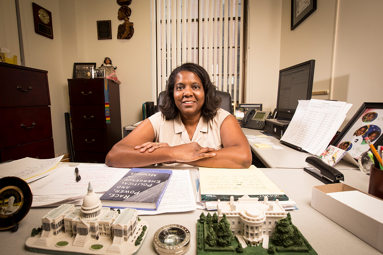 Photo of Professor Sharon Austin at her desk.