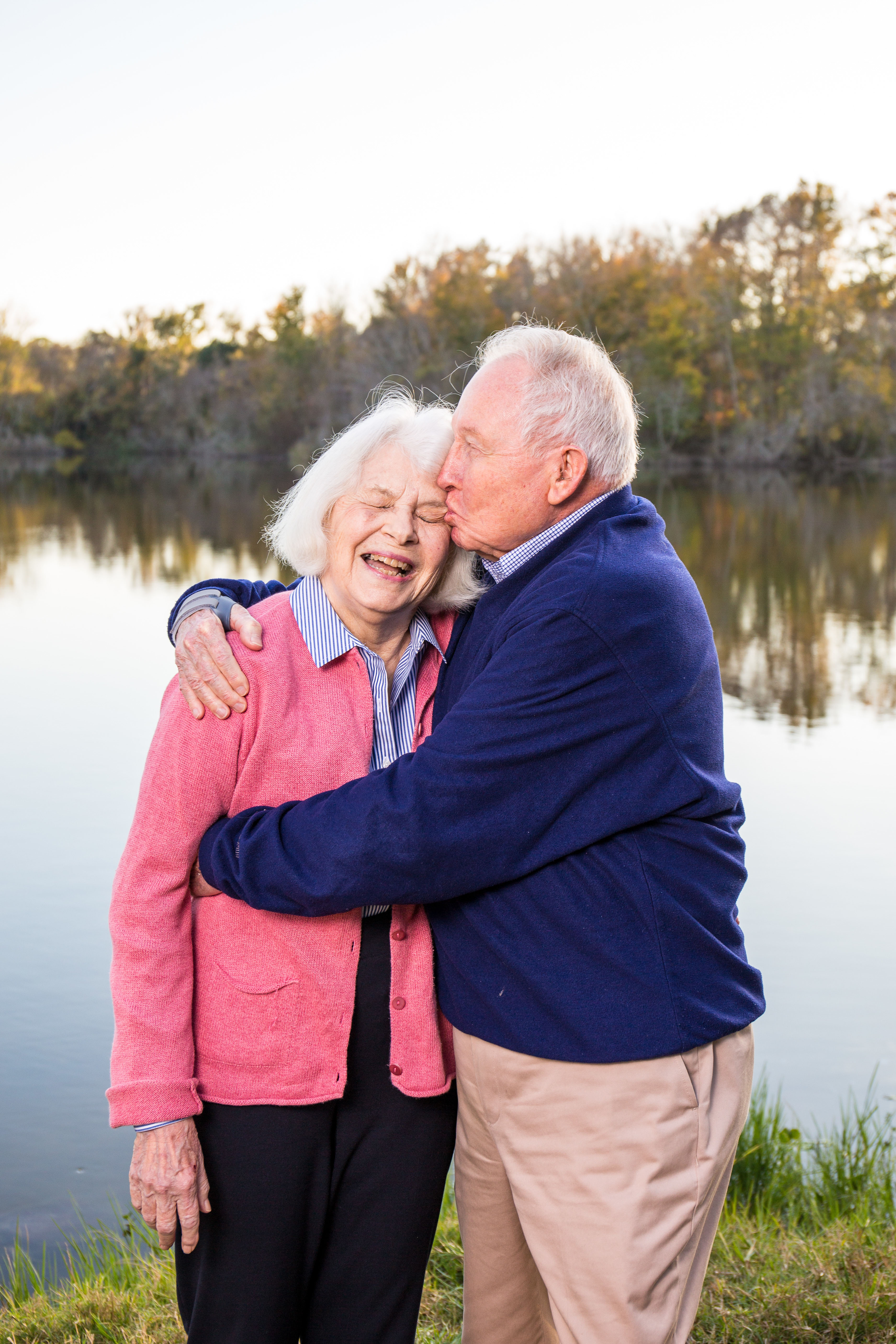 Photo of the Wiltshire at Lake Alice. Jim is hugging Susan and kissing her forehead.