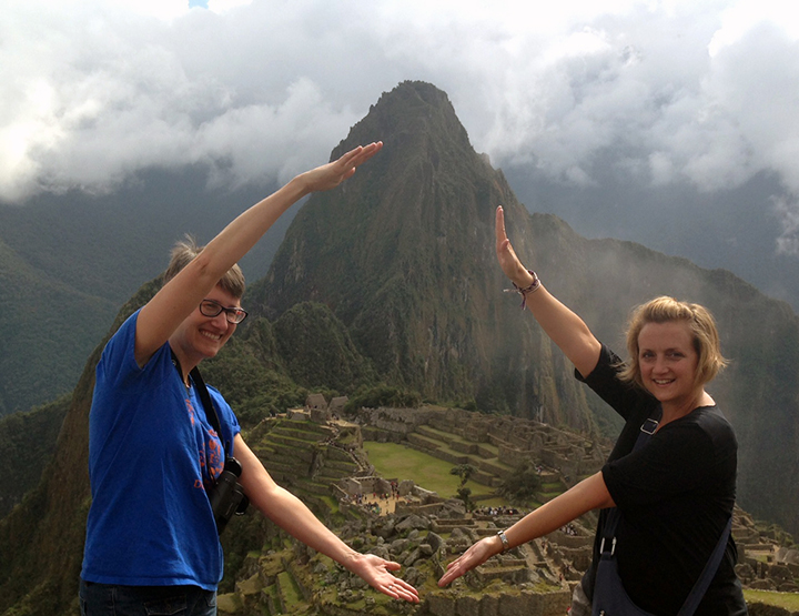 Dr. Wayne and Dr. Lord show their Gator spirit with a Machu Picchu chomp.