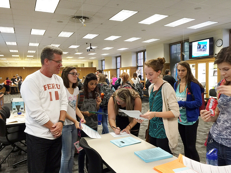 Dr. Moreland speaks with stuents at the SPS Major Event ( fall 2015)