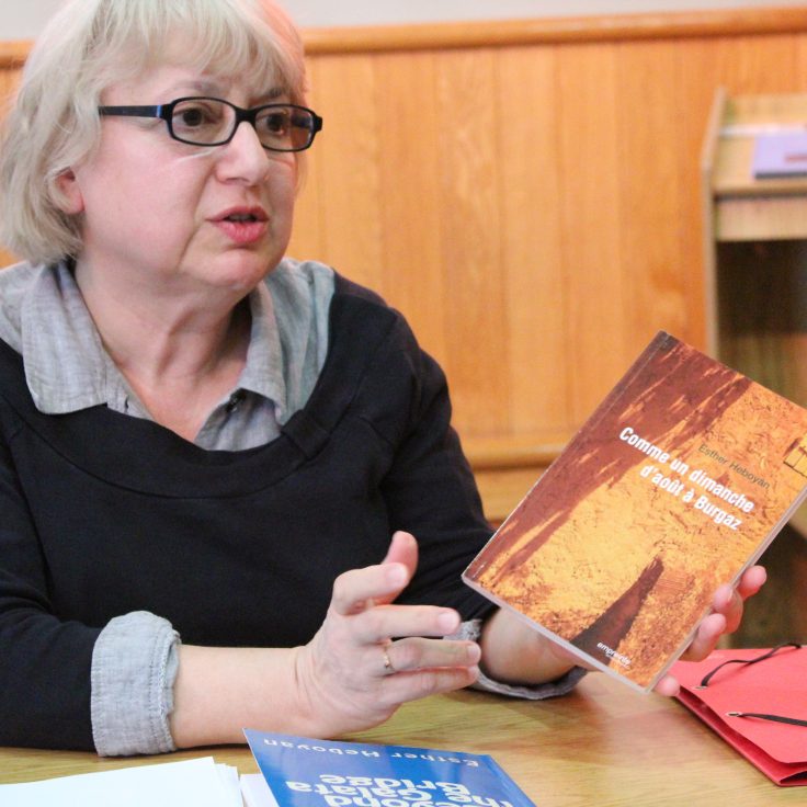 Esther Heboyan holding book and speking