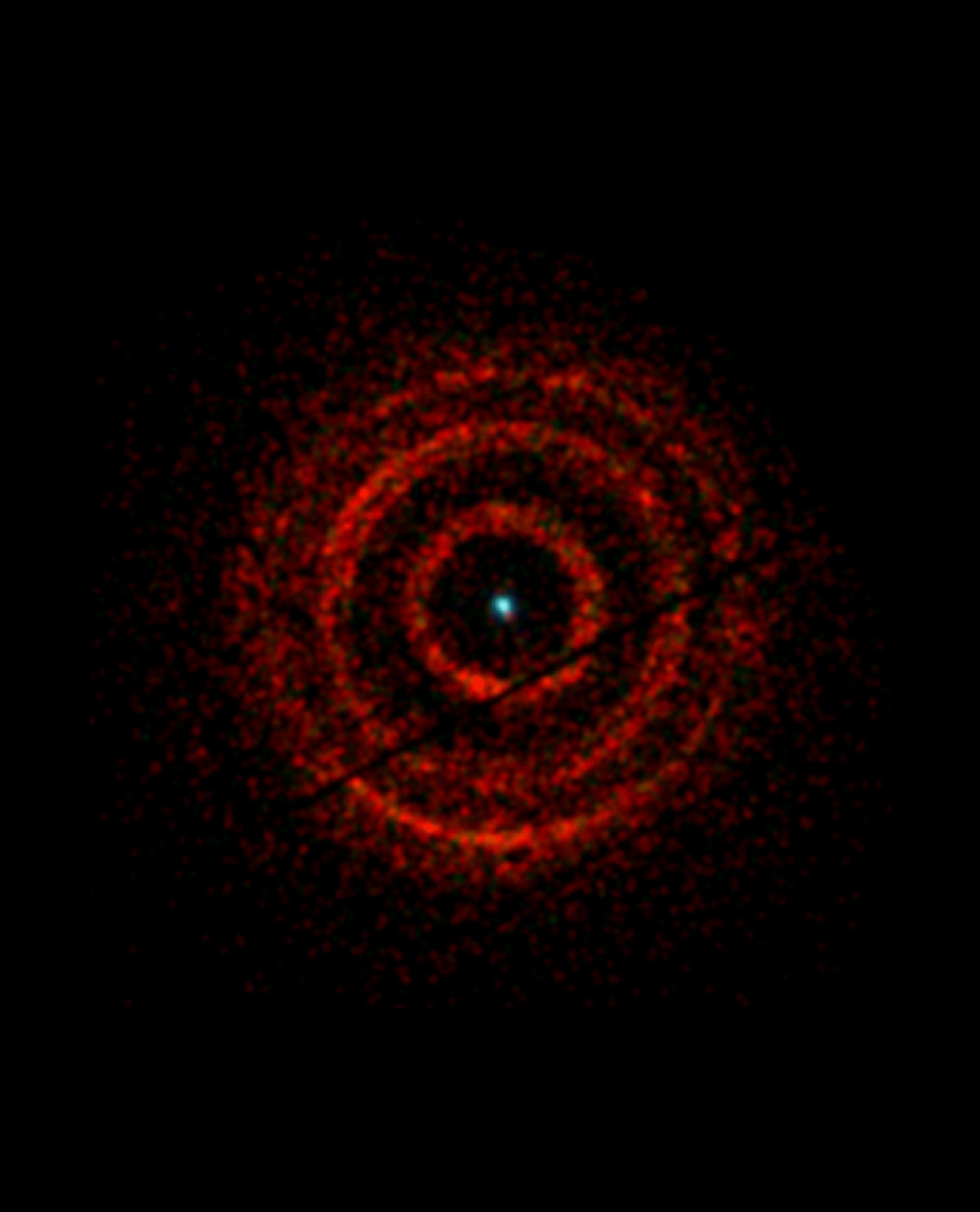 red ringed rendering of black hole