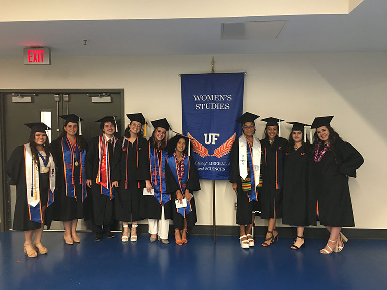 Women's Studies majors gathered for a photo before the College of Liberal Arts and Sciences graduation recognition ceremony at the Stephen C. O'Connell Center on Saturday, April 30th