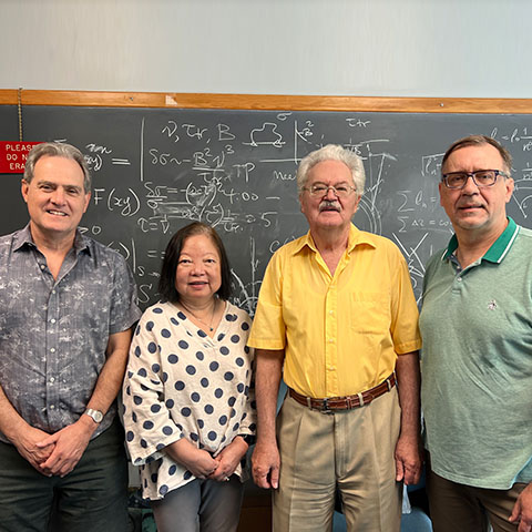 From left to right: Prof. Hirschfeld, Prof. Cheng, Dr. Usatenko, Prof. Maslov. At Dr. Usatenko’s office in the Department of Physics.