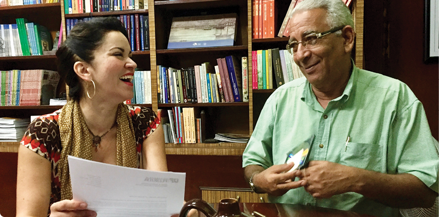 Lillian Guerra working with the director of the Biblioteca Nacional de Cuba José Martí.