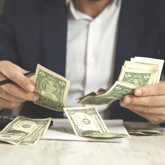 Businessman counting money