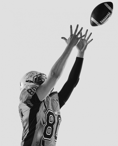 Player catching a football