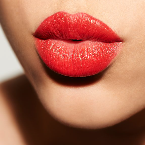Lips with bright red lipstick