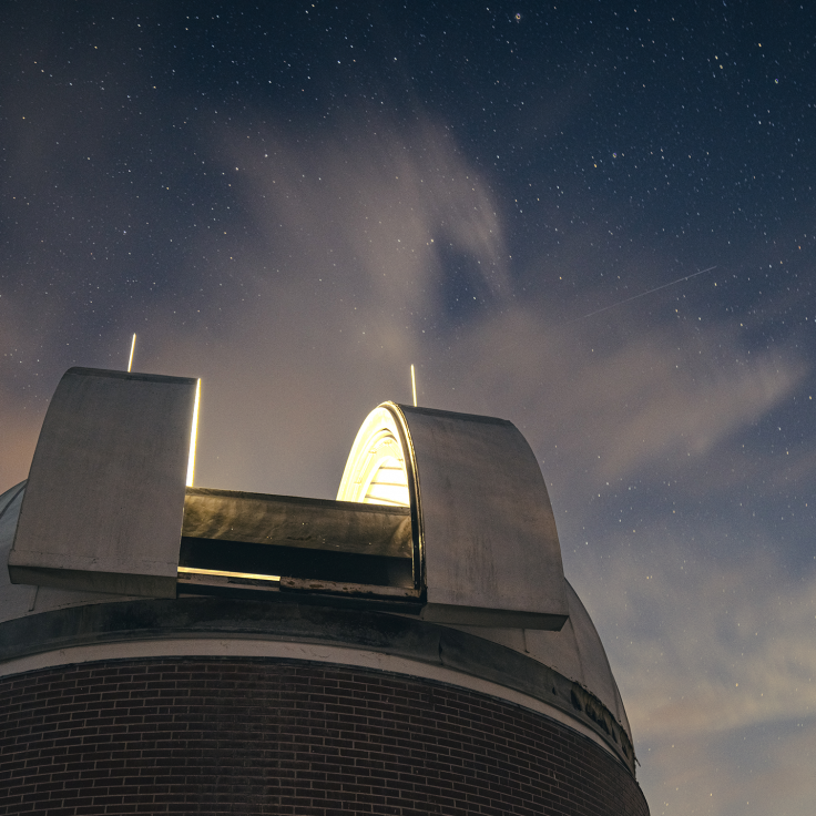 The larger of the two observatories opens its roof to allow those inside to look at the sky.
