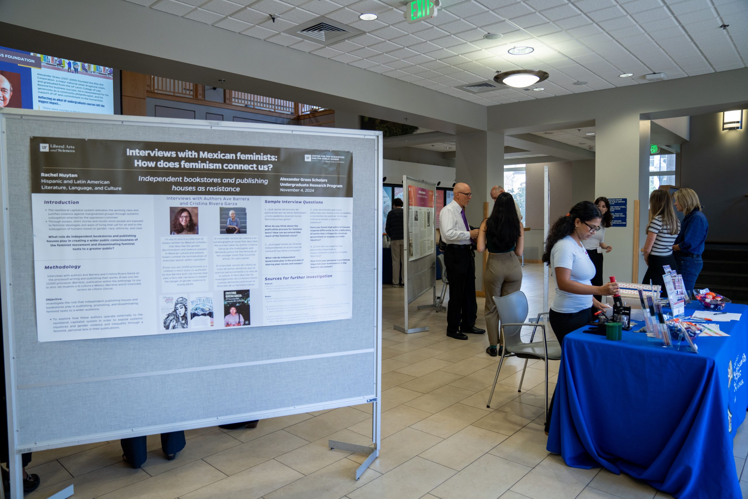 A poster board at the symposium titled "Interviews with Mexican Feminists."