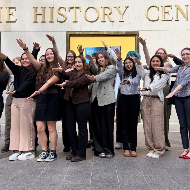 Students doing gator chomp at The History Center.